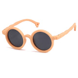 Load image into Gallery viewer, Round children&#39;s polarized fashion sunglasses with UV protection, soft silicone.